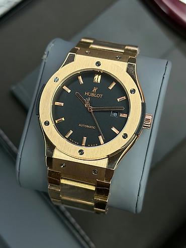saat alanlar: Yeni, Qol saatı, Hublot, rəng - Qızılı — 1