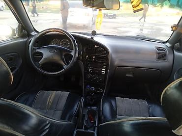 Kia: Kia Sephia: 1997 г. — 7