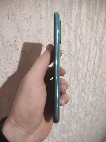 Xiaomi: Xiaomi Mi 10 5G, rəng - Göy, 
 İki sim kartlı — 11