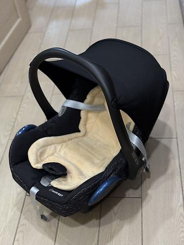 детские автокресла от 0 до 36 кг: Детское автокресло-переноска Maxi-Cosi (группа 0+) - Установка против — 5