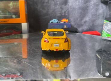 Avtomobil modelləri: Коллекционная модель Nissan 370Z Z34 yellow 2008 DeAgostini Scale — 7