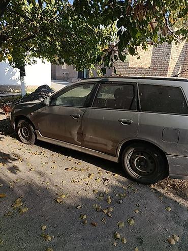 gak aion v: Nissan Wingroad: 2002 г., Универсал — 2