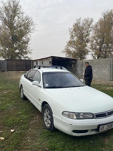 пинин ио: Mazda Cronos: 1994 г., Механика, Бензин, Седан — 2