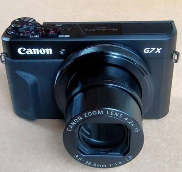 Photo Cameras: Canon G7 mark ii This camera was purchased new in December 2024. I am