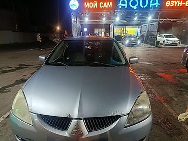 руль мицубиси: Mitsubishi Lancer: 2005 г., 1.6 л, Механика, Бензин, Универсал — 1
