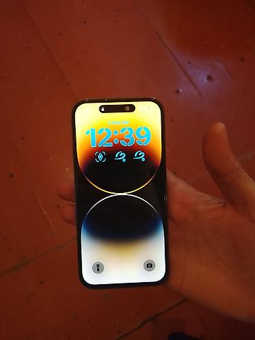 Apple iPhone: IPhone 14 Pro, Qara — 11