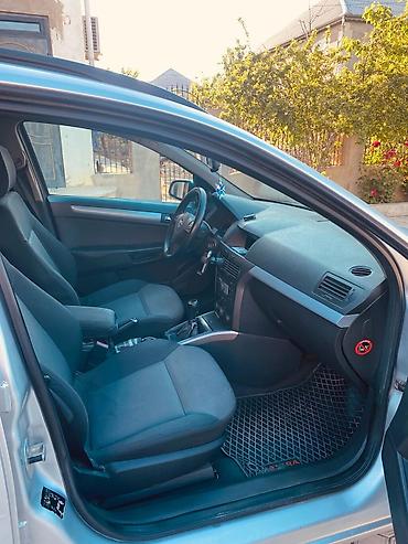 opel astra qiyməti: Opel Astra Caravan (Universal) – gümüşü rəng Texniki xüsusiyyətlər və — 2