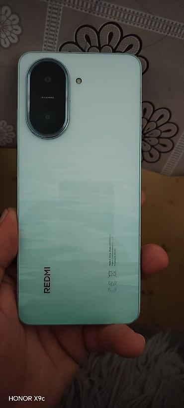 sierra blue: Redmi A5 - Rəng: Yaşıl (şampan-yaşıl ton) - Ekran: Böyük tam ekran — 5