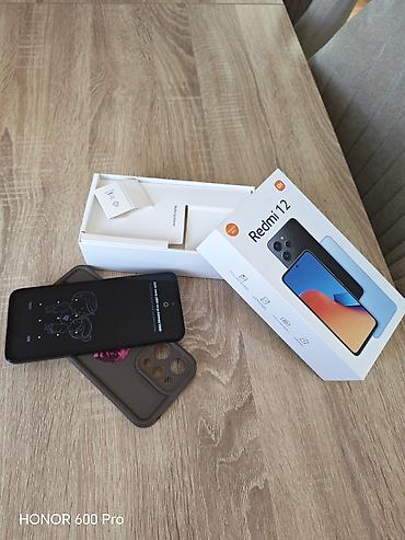 купить сяоми 12: Redmi 12, 128 ГБ, цвет - Черный, С документами — 2