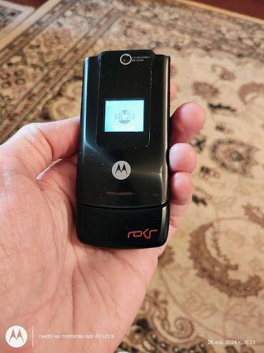 telefon qiymeti: Motorola Rokr E6, цвет - Черный