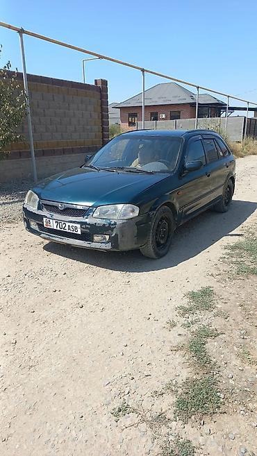 Mazda 323: 2000 г., 1.6 л, Механика, Бензин, Лифтбек