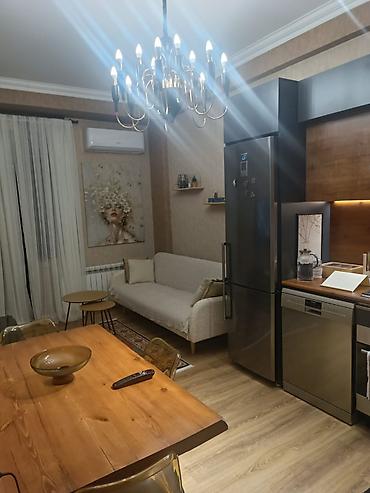 Mənzillər: Bakıxanov qəs., 2 otaqlı, Yeni tikili, 53 kv. m — 1