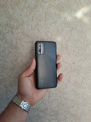 телефон флай 10: Xiaomi Redmi 9T, 64 ГБ, цвет - Синий, 
 Кнопочный, Отпечаток пальца, Две SIM карты