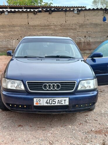 генезис авто: Audi A6: 1994 г., 2.6 л, Механика, Бензин, Седан