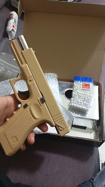 kicik qara don: Məhsul: Airsoft tapança (6 mm BB) Təsvir: - Qutu üzərində “GLOCK” — 5