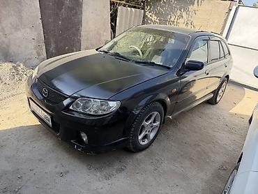 мустанг авто: Mazda 323: 2001 г., 2 л, Автомат, Газ, Универсал — 7