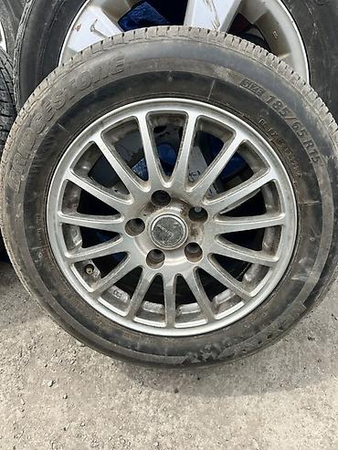 Летние шины Bridgestone 185/65 R15 на легкосплавных дисках - Размер