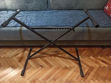 audio: Sklopivi stalak za klavijaturu. Visina od 68 do 92cm. Nedostaje jedna — 1