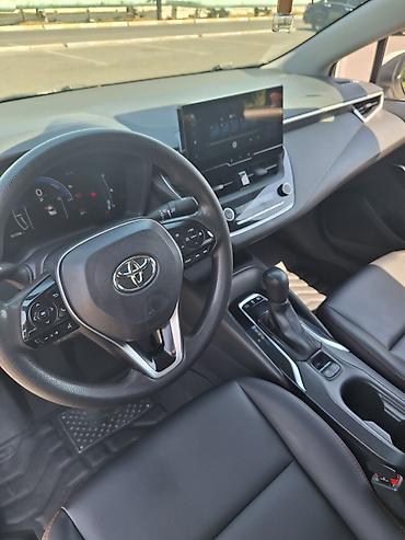 corola: Toyota Corolla: 2023 г., 1.8 л, Вариатор, Гибрид, Седан — 9