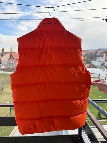 crivit helanke: Prodajem original Calvin Klein muški prsluk, narandžaste boje — 5