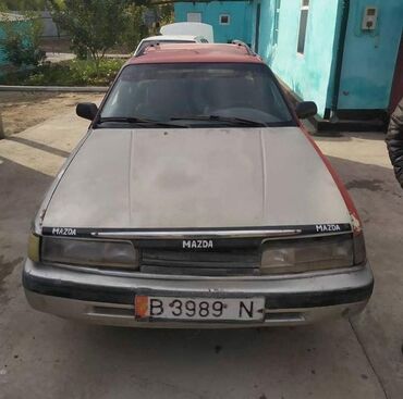 надпись на машину: Mazda 626: 1987 г., 2.2 л, Механика, Бензин, Универсал