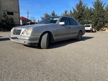 Mercedes-Benz: Mercedes-Benz E-Class: 2.3 l | 1997 il Sedan