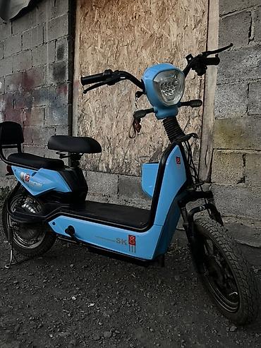 sena 50s: Электроскутер Gigini SK — компактный городской транспорт в голубом — 1