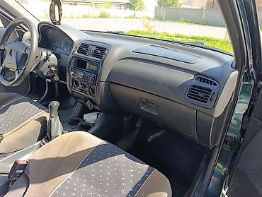385 55: Mazda 626: 1997 г., 1.8 л, Механика, Бензин, Седан — 9