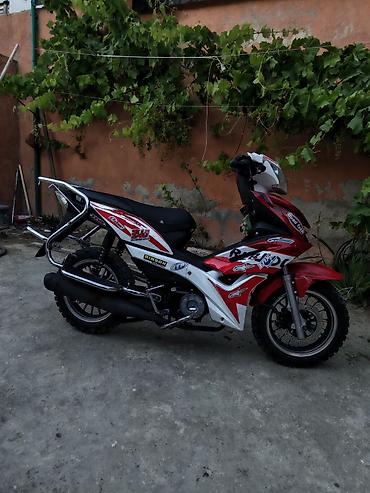 Motonəqliyyat: Skuter/moped – şəhər və yüngül off-road üçün Xüsusiyyətlər: - Kuzov — 1