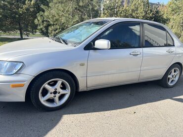 Mitsubishi: Mitsubishi Lancer: 2002 г., 1.8 л, Вариатор, Бензин, Седан