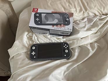 nintendo switch lite: Nintendo Switch Lite (серый) — компактная портативная версия Switch — 1