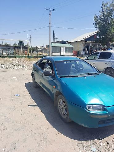 мазда 323 1994: Mazda 323: 1995 г., Хэтчбэк — 5