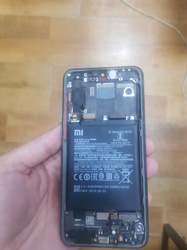 xiaomi note 10 irşad: Xiaomi Mi 9 SE, 128 GB, rəng - Qara, 
 Zəmanət, Sensor, Simsiz şarj