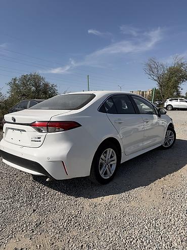 corolla 2016: Toyota Corolla: 2022 г., 1.8 л, Автомат, Гибрид, Седан — 2