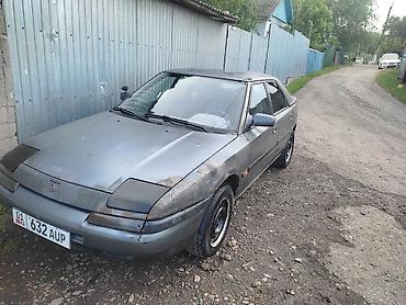 Mazda: Mazda 323: 1994 г., Механика, Бензин — 6