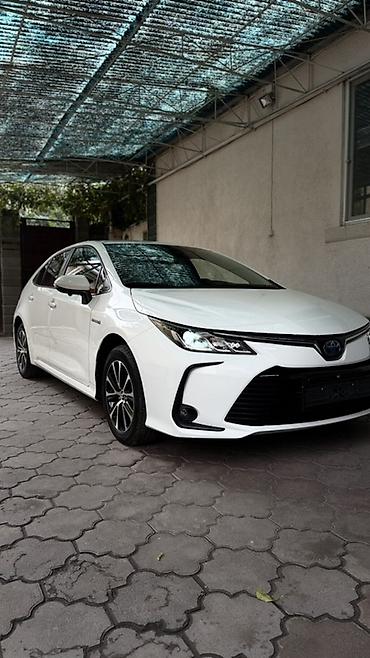 Toyota Corolla: 2022 г., 1.8 л, Автомат, Гибрид, Седан