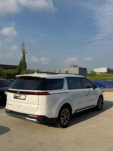 Kia: Kia Carnival: 2021 г., Минивэн — 13