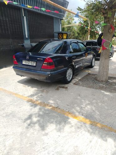 Информатика: Mercedes-Benz C-Class: 1.8 л | 1995 г. Седан