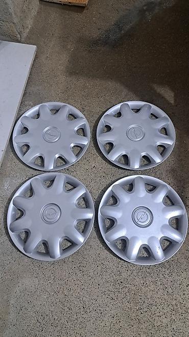 зеркало для автомобиля: Opel üçün orijinal disk qapaqları (4 ədəd) - Rəng: gümüşü - Material — 1