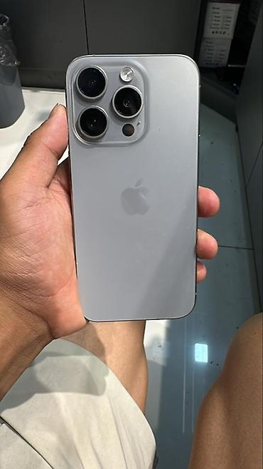 phone 12: Apple iPhone 15 Pro Max, титановый корпус Natural Titanium Ключевые — 1