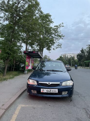 Mazda: Mazda 323: 1998 г., 1.5 л, Механика, Бензин, Седан