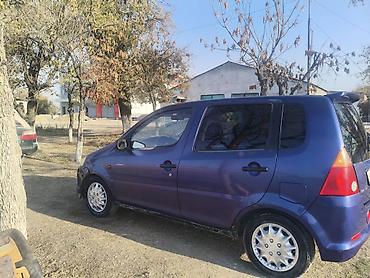 митсубиси спейк стар: Daihatsu YRV: 2003 г., 1.3 л, Механика, Бензин, Хэтчбэк — 5