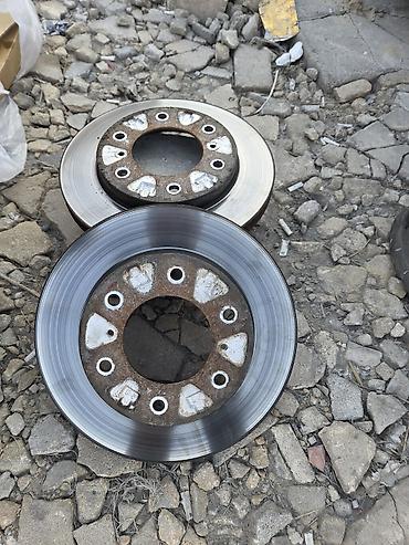 ağdağ dirək: Məhsul: Ön təkərlər üçün əyləc disk cütü Təsvir: - Şəkillərdə — 1
