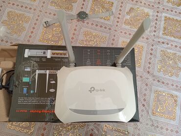 modem 4 antenli: Wi-fi modem tp-link 2 antenalıtam işlək.Adapteri və qutusu ilə