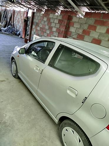 ешка е 303: Nissan Pixo: 2010 г., 1 л, Автомат, Бензин, Хэтчбэк — 2