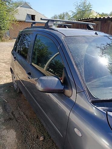 урус машина: Mazda Verisa: 2003 г., 1.3 л, Кол менен иштөөчү, Бензин, Хетчбек — 2