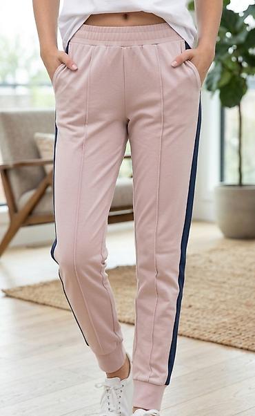 ski pantalone decathlon: Ženske trenerka pantalone – svetloružičaste sa tamnoplavim bočnim — 1