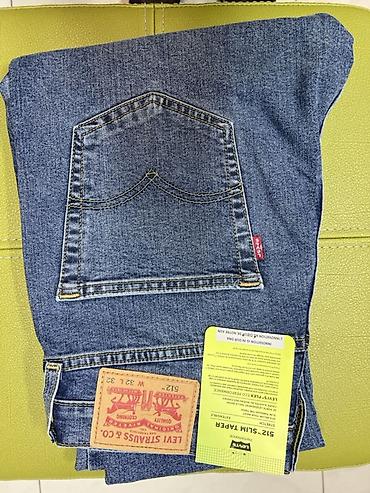 Джинсы: Levi’s 512 Slim Taper — мужские джинсы с заужением к низу. - Линия — 5