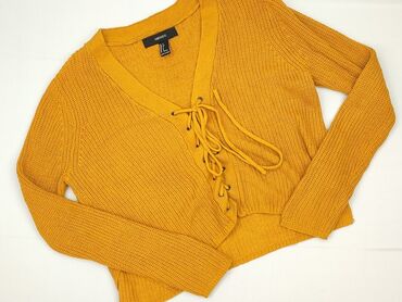 Żółty kardigan damski marki Forever 21. Ten sweter ma długie rękawy i