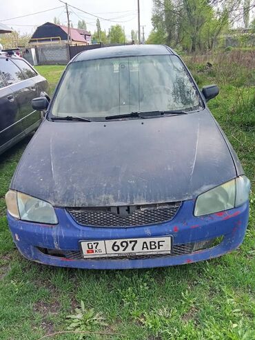 Mazda: Mazda 323: 1999 г., 1.6 л, Механика, Бензин, Универсал